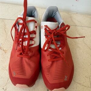 On Running Red and White Sneakers